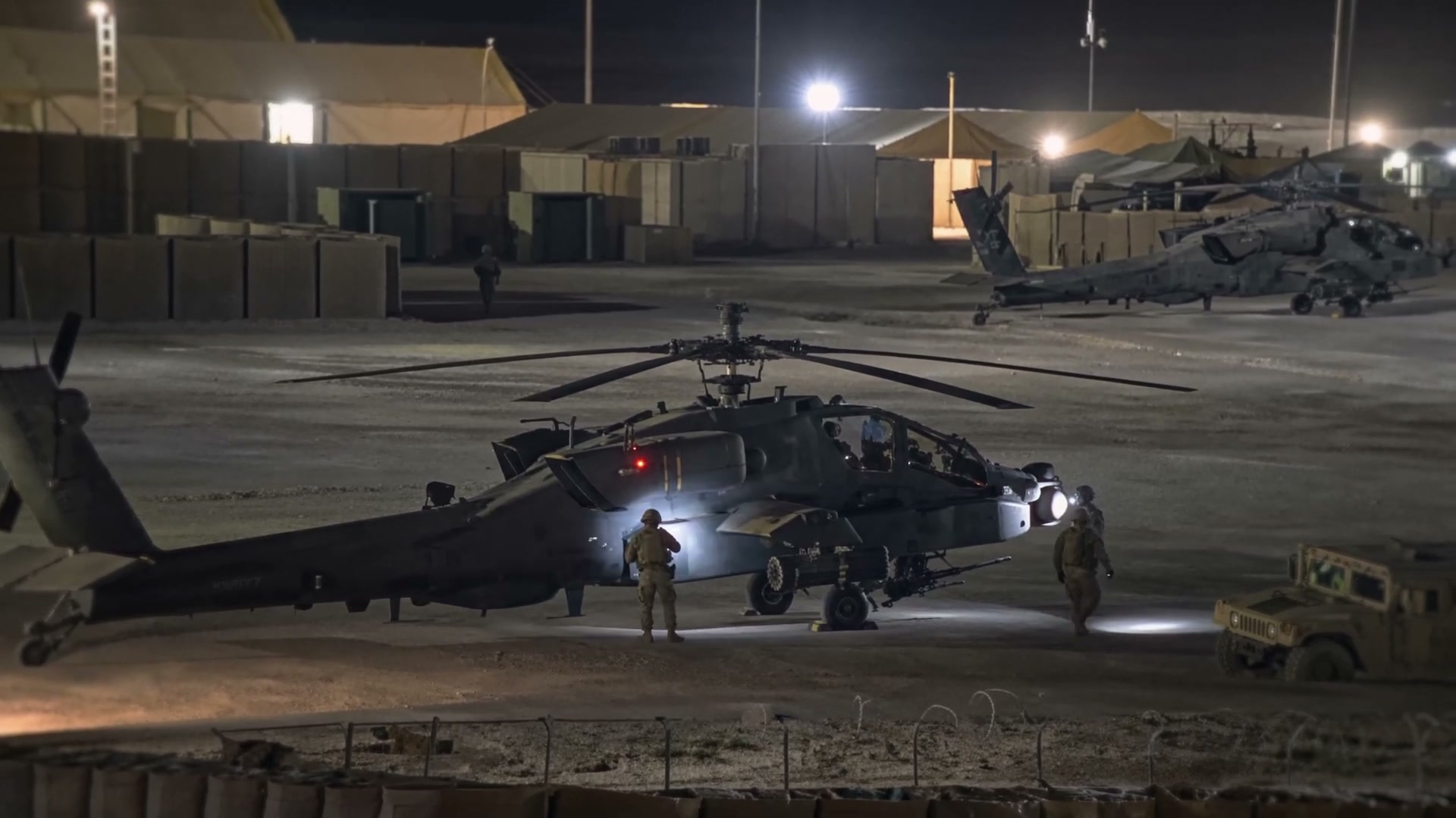Qasrak Air Base, Syria — the film opens in grounded military-documentary mode.