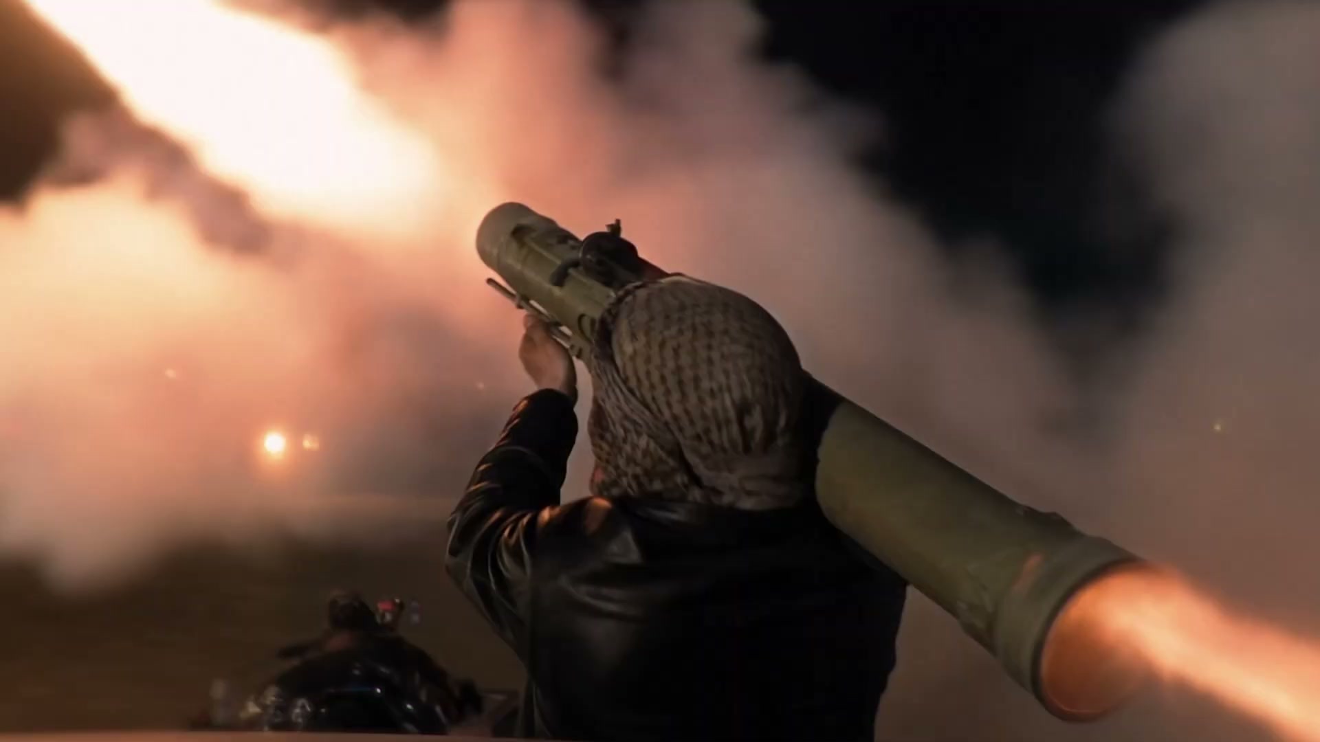 An insurgent fires the rocket that brings Hollis down.